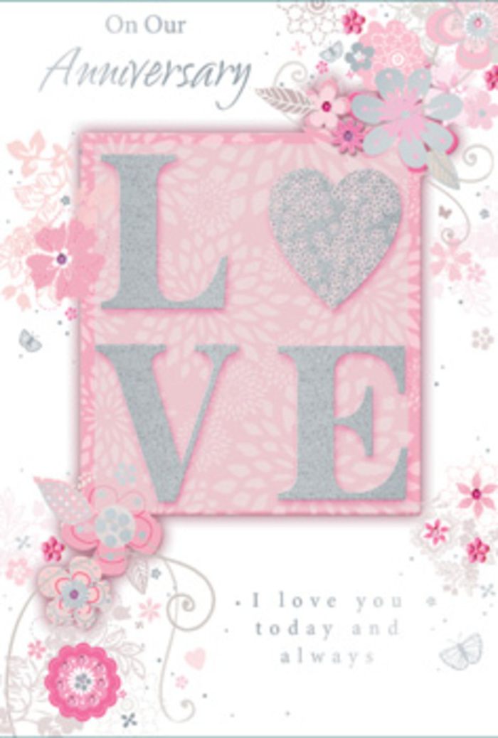 The anniversary card in this image feels like a hand-tied bouquet captured on soft, textured paper, the kind of thoughtful keepsake you might choose while planning a romantic surprise at home in Creekmouth. Dominating the centre, the word LOVE appears in bold, raised lettering, dusted with fine glitter that glimmers in pearly white and silver tones. The surface looks tactile and gently embossed, suggesting a pleasant, almost luxurious feel under the fingertips. Around this central word, a cascade of stylised flowers, buds, and curling leaves spreads outward, arranged with the balance and rhythm of a carefully designed bouquet. These blooms are rendered in tender shades of blush pink, soft mauve, and creamy white, with subtle grey and silver highlights that lend a refined, almost bridal elegance. Each petal and leaf is drawn with delicate, flowing lines, evoking the sketchbook of a florist mapping out romantic designs for local anniversary deliveries. The background is a soft, powdery pink, slightly mottled, giving a sense of depth and warmth, as though the card is glowing gently. Tiny decorative flourishes-fine scrolls, small sprays, and barely-there accents-add movement, like petals caught in a light breeze by the river's edge. The sentiment, set in an understated, graceful script, speaks of lasting affection and shared moments, its placement harmonising with the floral frame. Altogether, the card conveys a sense of intimate celebration, combining tactile luxury with a dreamy, floral charm that mirrors the feeling of receiving a beautifully arranged anniversary bouquet at your Creekmouth doorstep.